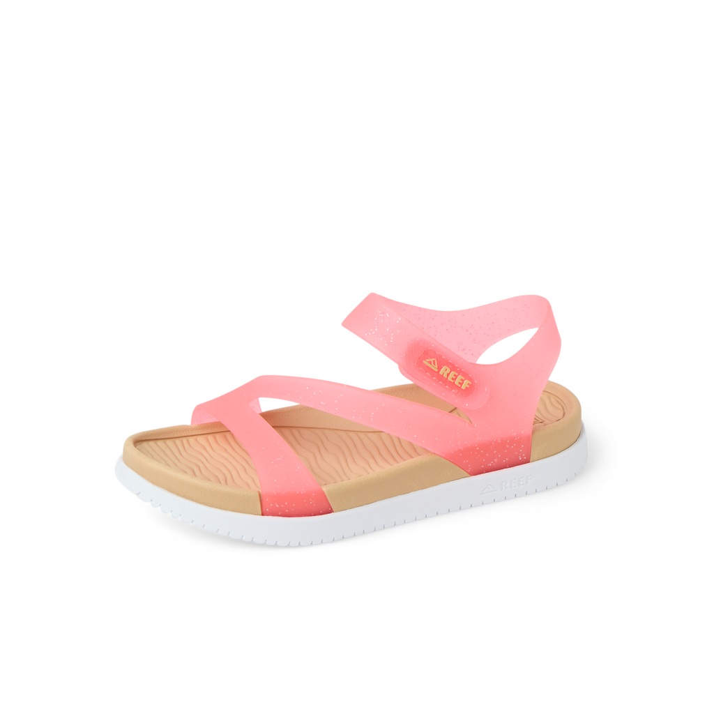 Little Cali Coastin pink girls’ sandal facing right, close-up of cushioned footbed and straps, beach-inspired comfort.