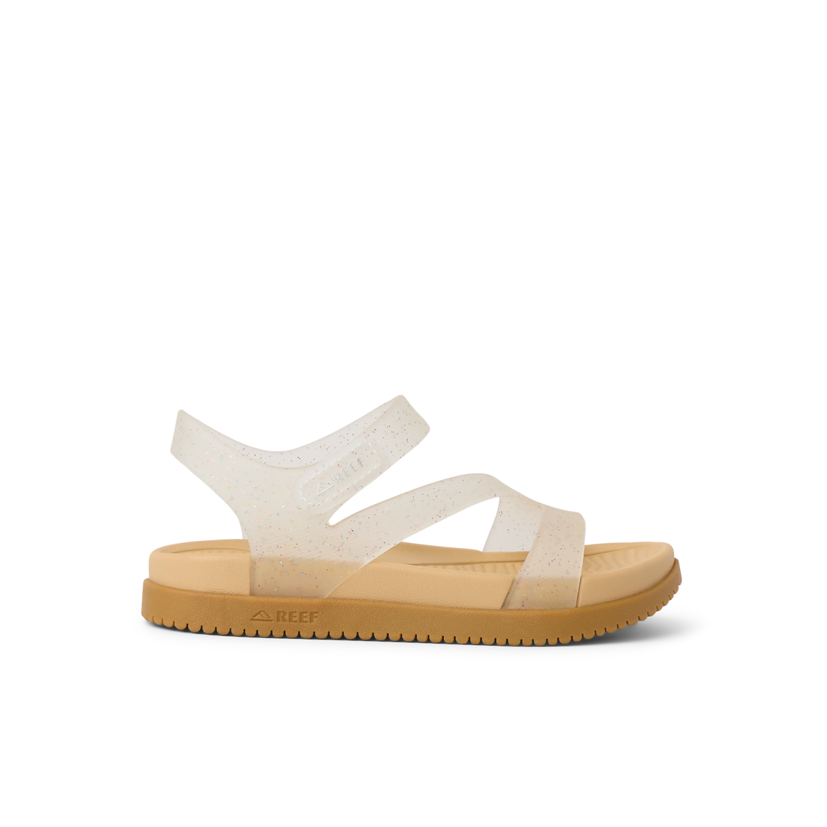 Little Cali Coastin sandal for girls facing left, showing side view with glitter confetti straps and cushioned sole.