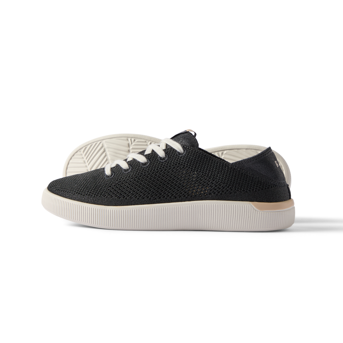 Reef Neptune women's black sneaker facing right, close-up of side, lightweight with anatomical arch support and cushioned sole.