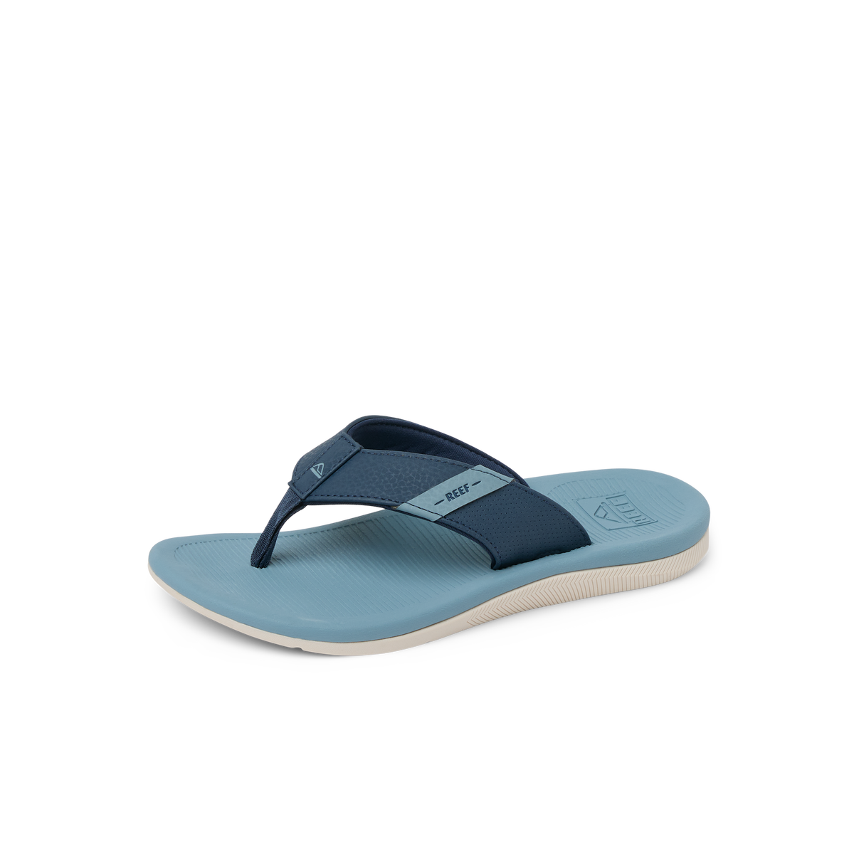 Kids Santa Ana flip flop facing left, featuring soft blue and navy straps with anatomical arch support for comfort.