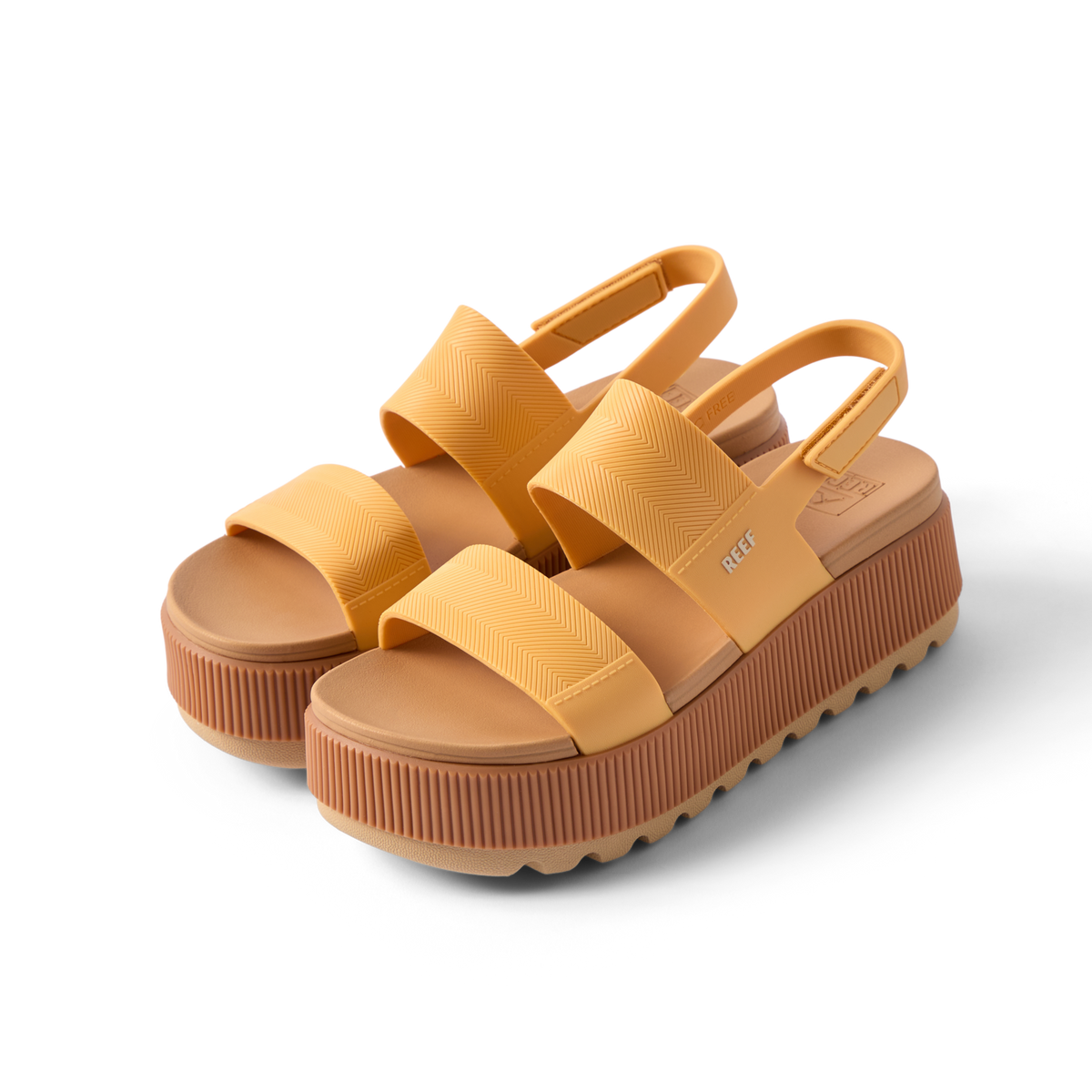 Pair of Water Vista Higher women's sandals facing right, featuring cushioned platform soles and water-friendly straps in golden apricot.