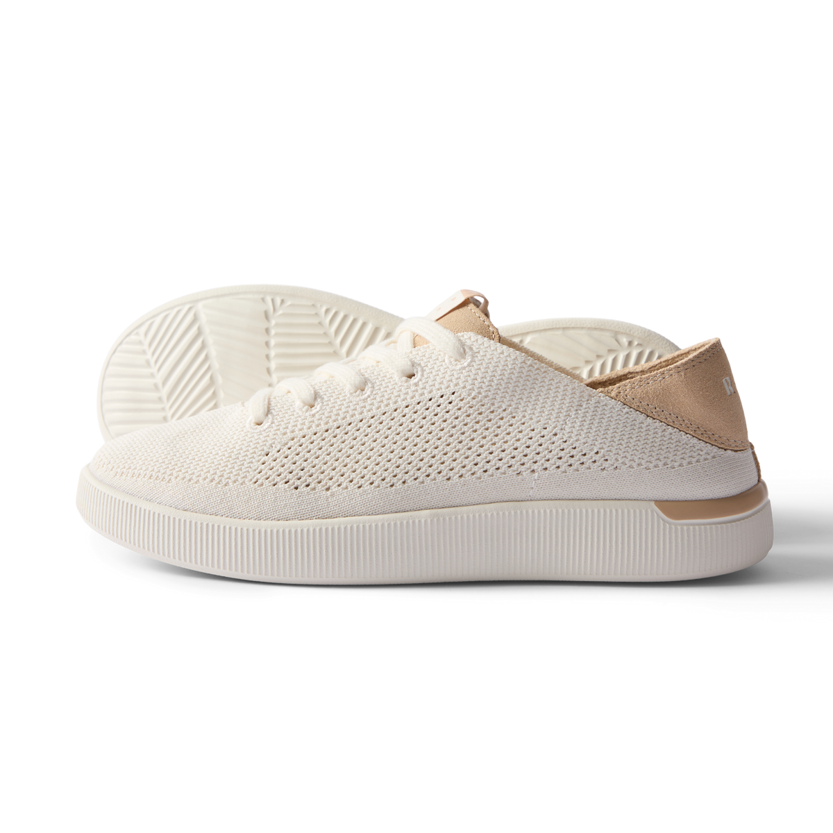 Reef Neptune women's left side sneaker facing right, white and champagne, breathable knit with cushioned sole for comfort.