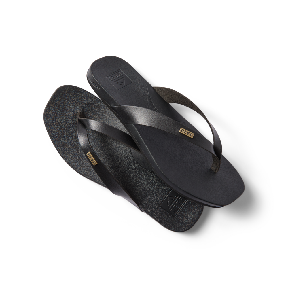 Vista Lune women’s black flip flops facing right, showing top and bottom with soft-rebound cushioning and arch support