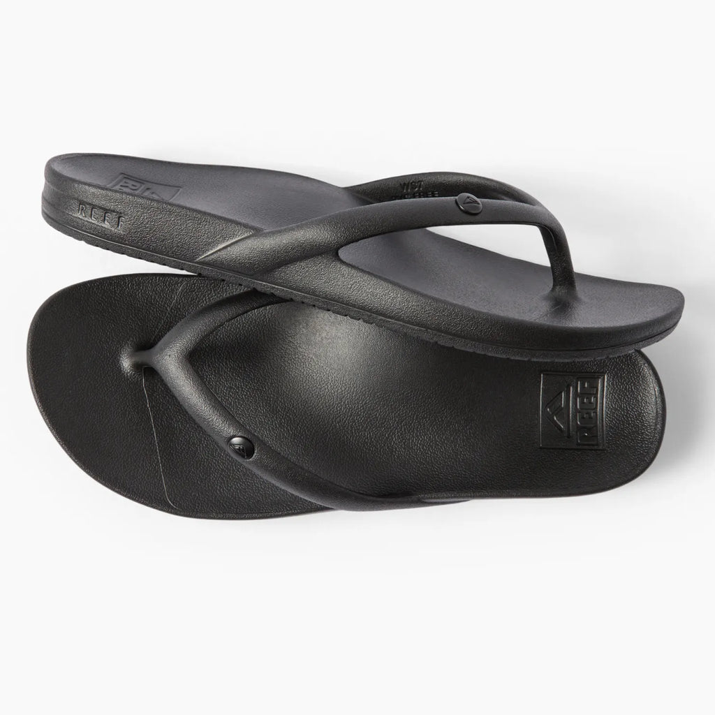 Vista Vay-Cay black flip flops for women, top view showing toe post and cushioned footbed, surf-inspired comfort design.